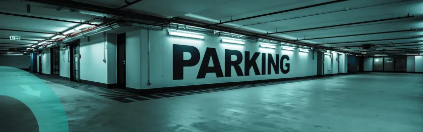 Vue d'un parking intérieur sécurisé illustrant la supervision des accès véhicules pour garantir la fluidité et la sécurité des usagers